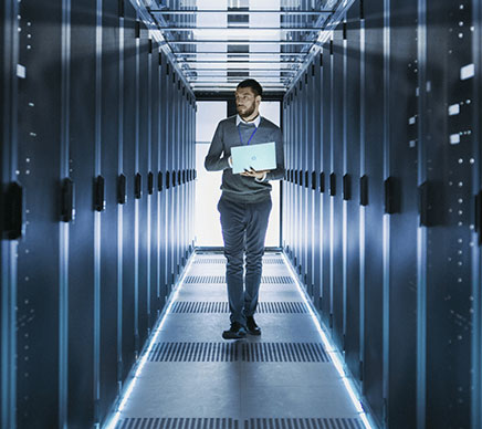 cloud computing consultant walking through servers