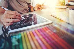 Website designer working on a tablet